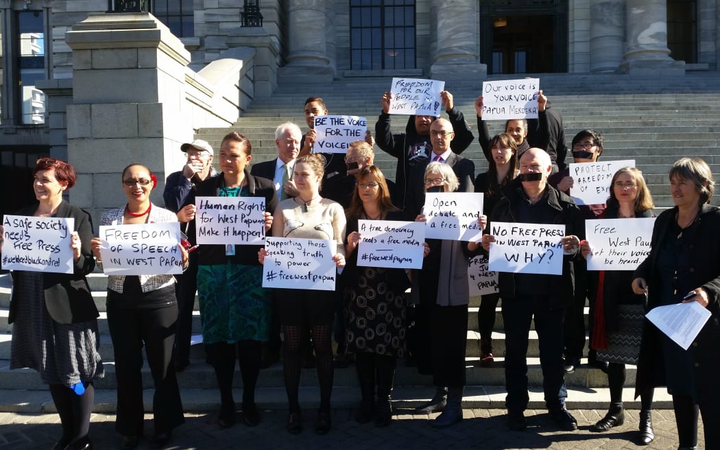 Protestors calling for open access for media and aid groups to West Papua gather outside parliament in Wellington.