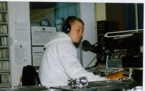 Radio Active Breakfast host Lewis Tennant in studio 1997.