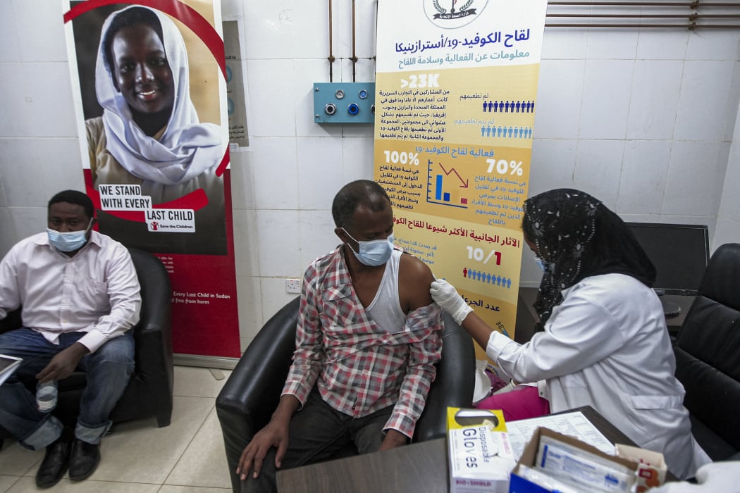 A man receives a dose of the Oxford-AstraZeneca COVID-19 coronavirus vaccine at the Jabra Hospital for Emergency and Injuries in Sudan's capital Khartoum on March 9, 2021.