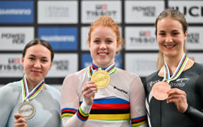 Picture by Simon Wilkinson/SWpix.com - 25/10/2025 - Cycling - 2025 Tissot UCI Track World Championships - Velódromo Peñalolén, Santiago, Chile - Women’s 1km Time Trial Podium - Hetty van de Wouw (Netherlands) receiving the Gold Medal to become World Champion, Iana Burlakova (AIN) receiving the Silver Medal and Ellesse Andrews (New Zealand) receiving the Bronze Medal