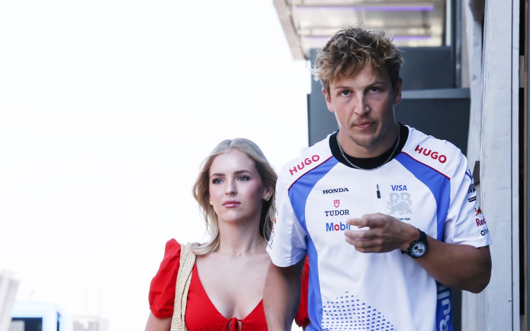 New Zealand F1 driver Liam Lawson and partner Hannah St John.