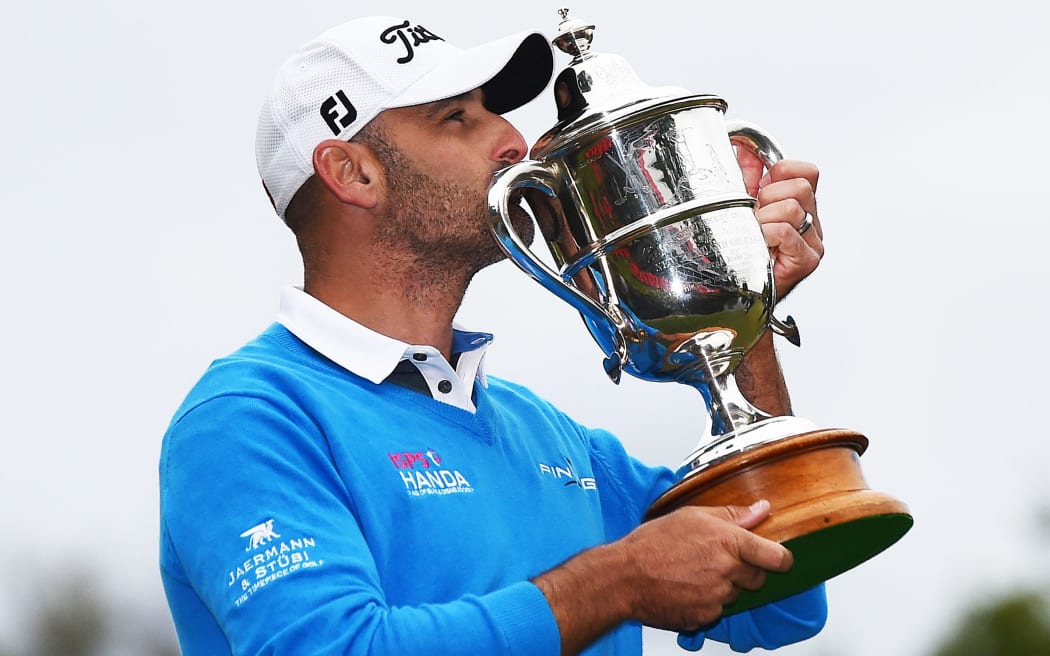 Michael Hendry with the Brodie Breeze trophy.