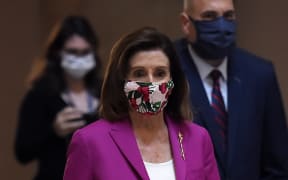 House Speaker Nancy Pelosi walks past the Statuary Hall at the US Capitol on May 15, 2020 in Washington, DC -