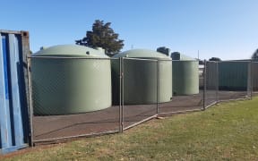 Emergency water tanks at Kaikohe. Level 4 water restrictions are being applied in Kaikohe restricting residential water use to drinking, cooking and washing only. 5 February 2020.