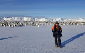 Producer Alison Ballance with the Emperor penguin colony at Cape Crozier, which was the subject of the book 'The worst journey in the world.'