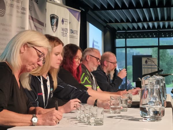 Judges marking water from four district councils in the 2025 Best Tasting Tap Water grand final in Nelson.