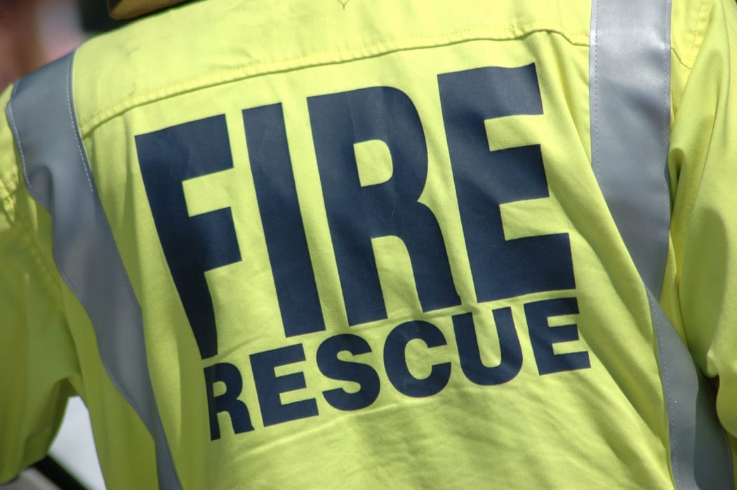14915103 - fireman wearing a fire rescue jacket