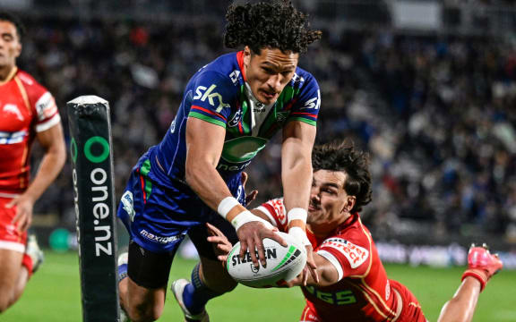 Dallin Watene-Zelezniak of the Warriors dives to score a try, NZ Warriors v Dolphins.