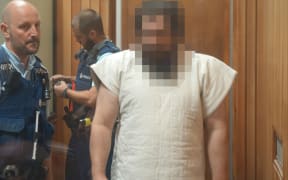 The man accused of stabbing six people in Whanganui. The judge ordered his face must be pixelated.
