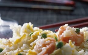 Close-up of fried rice with shrimps. (Photo by Brisbois / Wikholm / Photononstop / Photononstop via AFP)