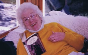 Joan Scott reading one of her favourite books.