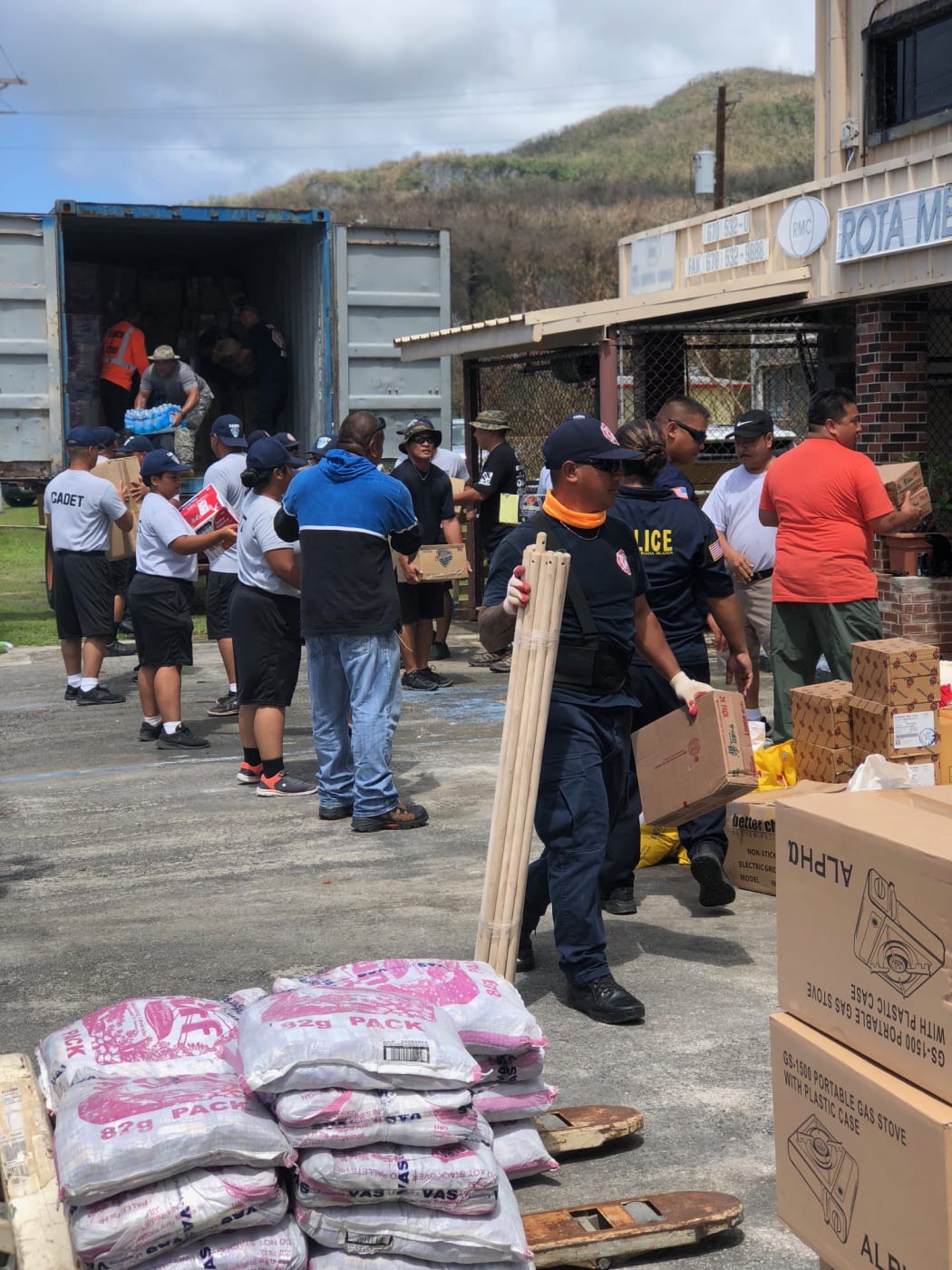 Donation drive supplies being offloaded in Rota