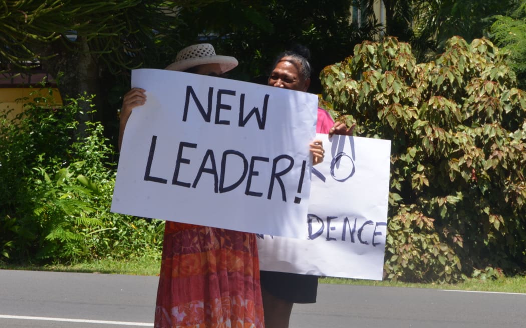 A group of women supporting the no-confidence motion against the Prime Minister and his Cabinet with their banners outside Parliament yesterday. TALAIA MIKA