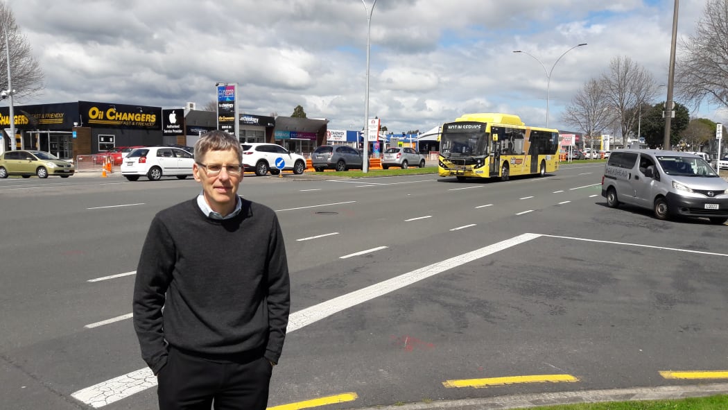Glen Crowther of Sustainable BOP trust, standing on Cameron Rd, the main drag through Tauranga.