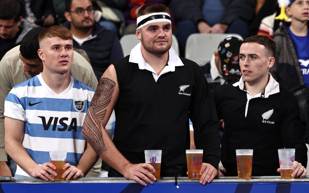 Supporters wait for the beginning of the France 2023 Rugby World Cup semi-final match between Argentina and New Zealand at the Stade de France in Saint-Denis, on the outskirts of Paris, on October 20, 2023. (Photo by Anne-Christine POUJOULAT / AFP)