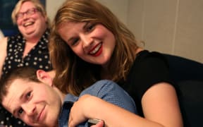 A photo of Elle Hunt with Megan Whelan and Craig McCulloch