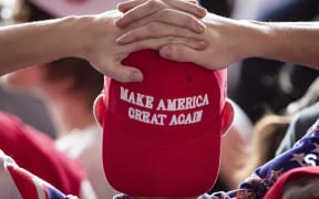 MONTOURSVILLE, PA - MAY 20: A man wears a 'Make America Great Again' hat as he waits for U.S. President Donald Trump to arrive for a 'Make America Great Again' campaign rally at Williamsport Regional Airport, May 20.