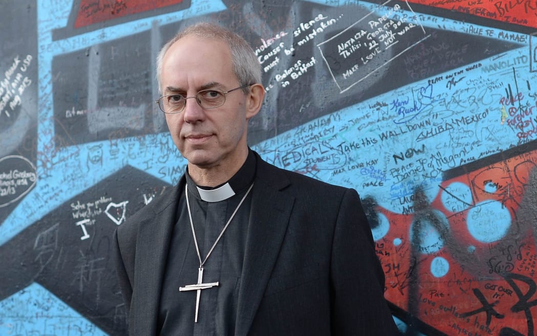 The Archbishop of Canterbury, Justin Welby at the Peace Wall in Belfast. October 2014.