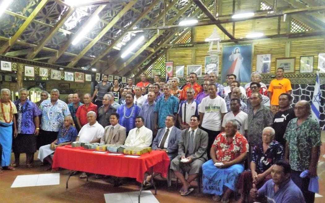 Sasina village council with church ministers and MP Laaulialemalietoa Leuatea Polataivao Schmidt.