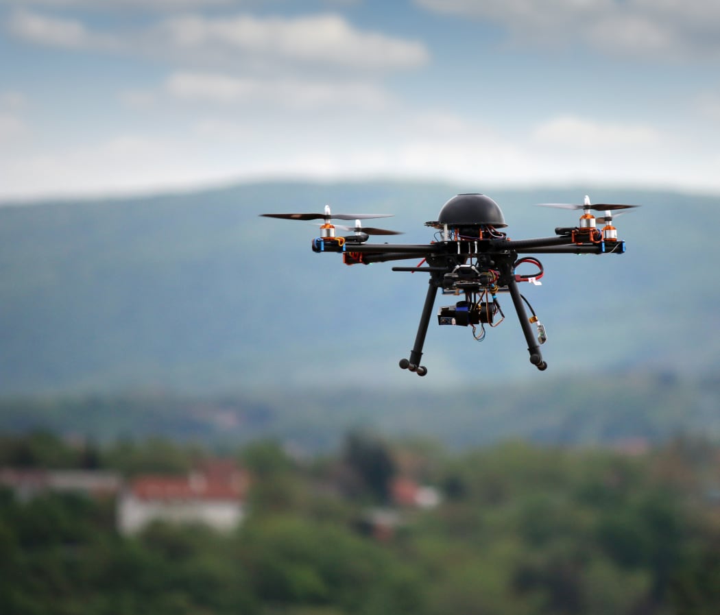 flying drone with camera on the sky