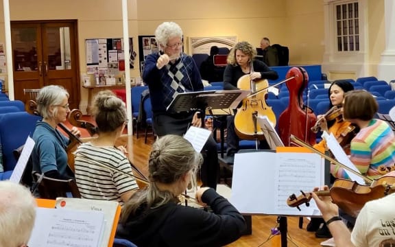 Wellington City Orchestra in rehearsal, 2024. Conductor is Donald Maurice, cello soloist is Inbal Megiddo