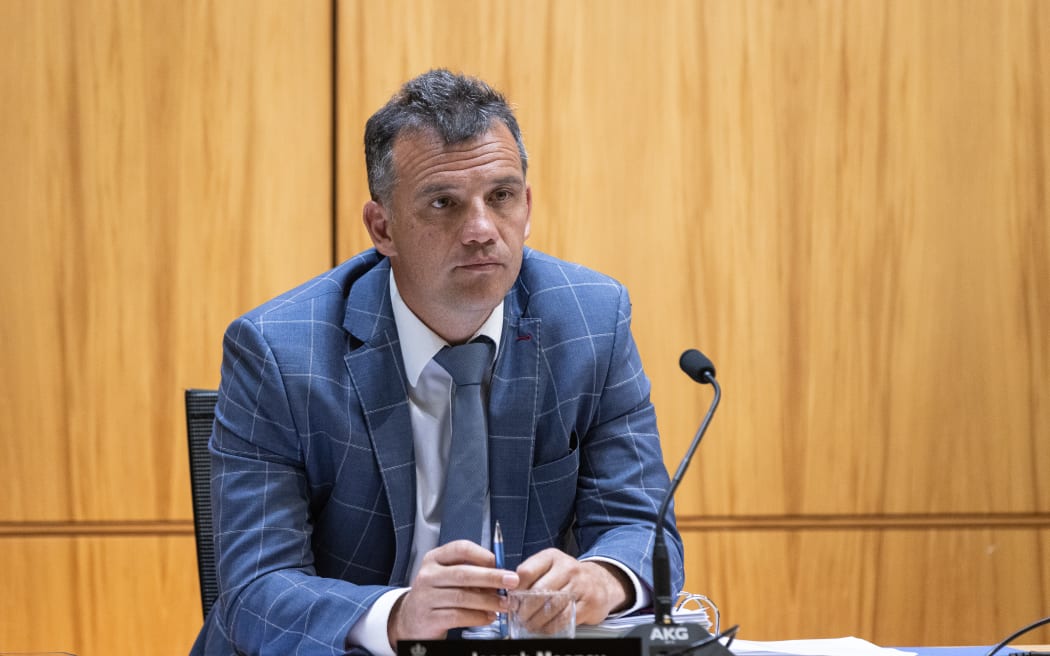 National Party MP Joseph Mooney chairing the Social Services and Community Committee.