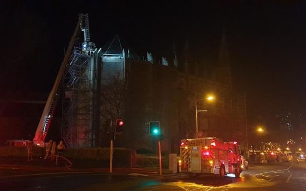 A crane at St Paul's Cathedral in Dunedin where fire broke out in the roof overnight.