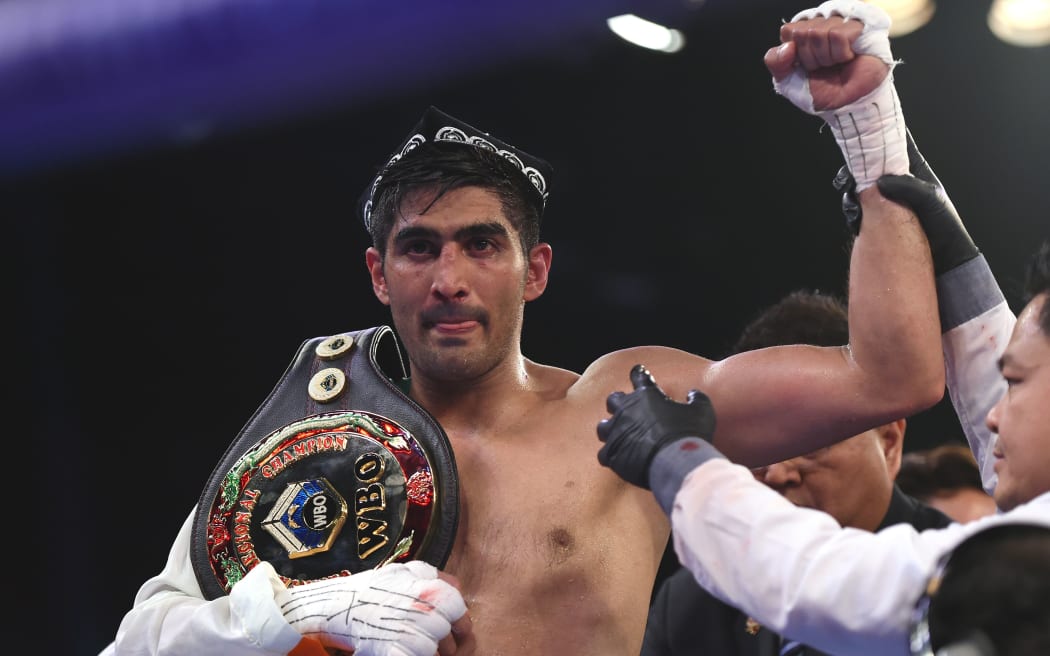 WBO Asia-Pacific Super Middleweight champion Vijender Singh celebrates after winning the double title bout against China's Zulpikar Maimaitiali.