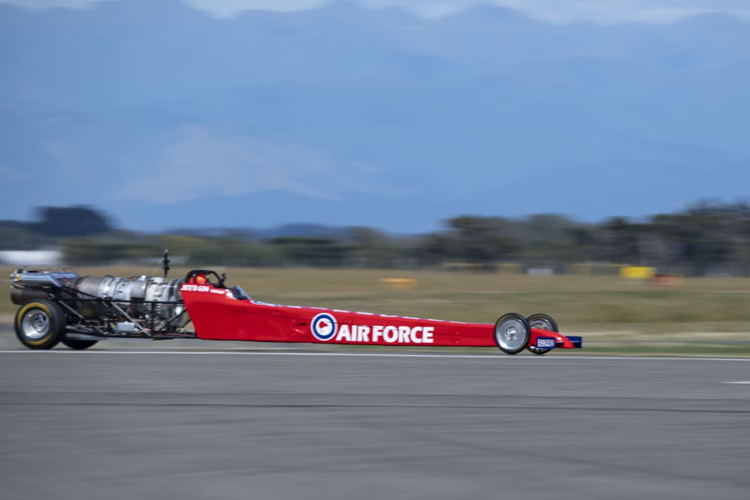 The jet-powered dragster reached a top speed of 458.2 km/h.