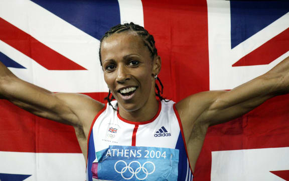 Kelly Holmes celebrates afetr winning Gold in the Women's 1500 metres, Olympic Games, Athens, Greece. 28 August 2004