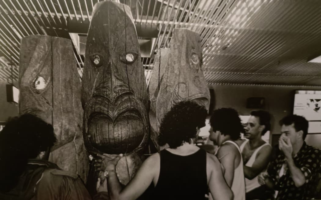 Te Rākau's pou at an early show.