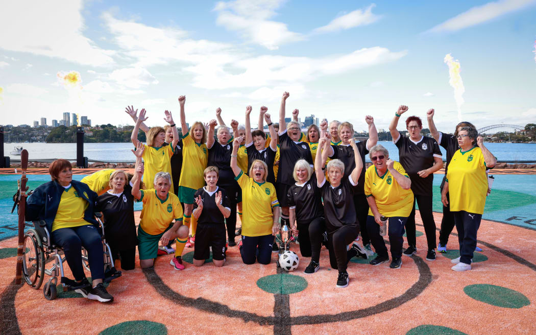 Players pose for a photo ahead of the 1975 OG Australia v New Zealand Rematch on PUMA Island July 22, 2023 in Sydney, Australia.