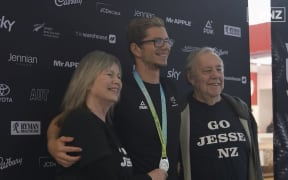 Para-swimmer Jesse Reynolds with his parents Neil and Tracy.