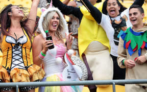 Sevens fans partied despite wet and windy weather.