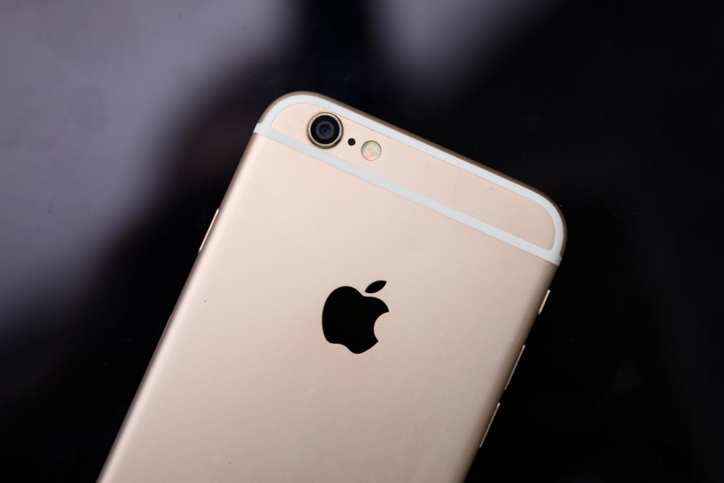 Apple fined for slowing down old iPhones RNZ News