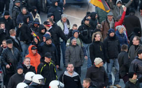 Police using water cannon at a rally of the far-right anti-immigrant Pegida movement in Cologne.