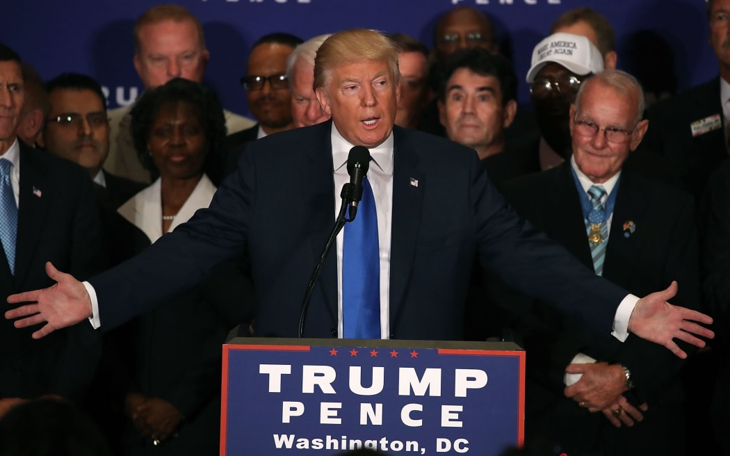 Surrounded by military veterans, US Republican presidential nominee Donald Trump says US President Barack Obama was born in the United States, during a campaign event at the Trump International Hotel, September 16, 2016 in Washington, DC.