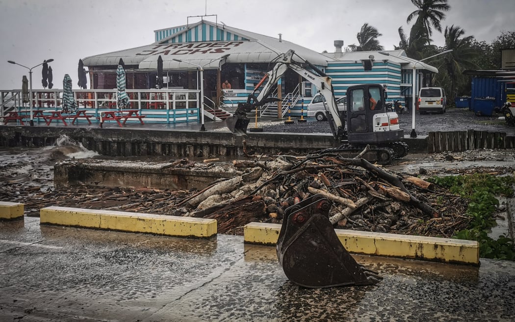 An excavator clearing the debris from the harbour area at Trader Jack’s, one of the most popular spots on Rarotonga. TALAIA MIKA/ 24121737, 24121738, 24121739