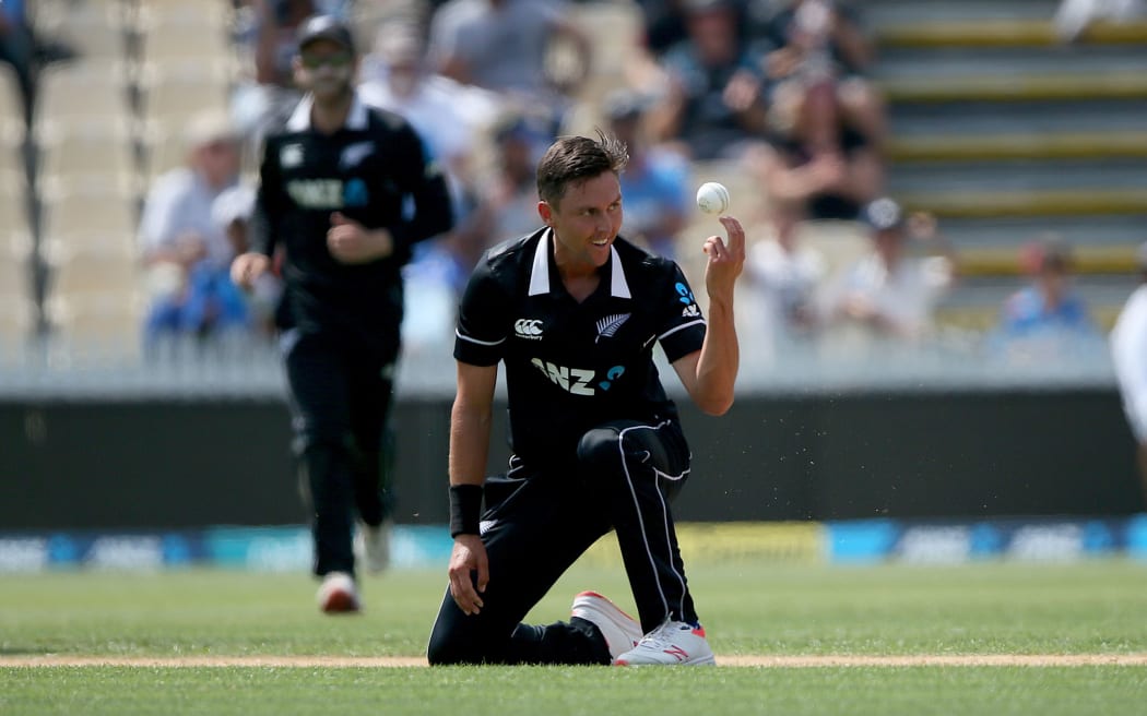 New Zealand's Trent Boult takes a caught and bowled to dismiss India's Rohit Sharma during the 4th One Day International cricket match.