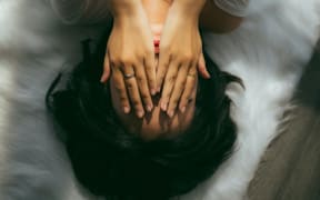 girl with hands on face