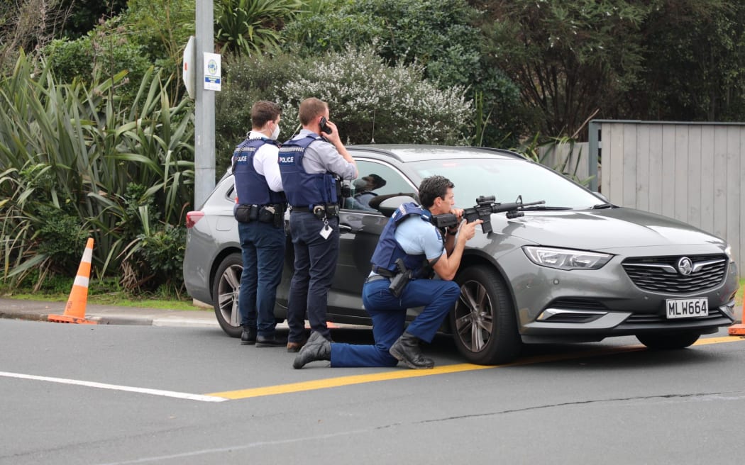 Police surround a house in Bardia Street, Belmont.