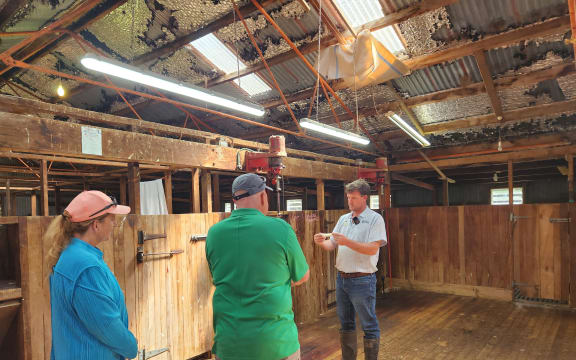 Bradley explains the traits of wool to lodge guests in the woolshed