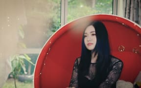 Iris Zhang in 'Small Ache' music video