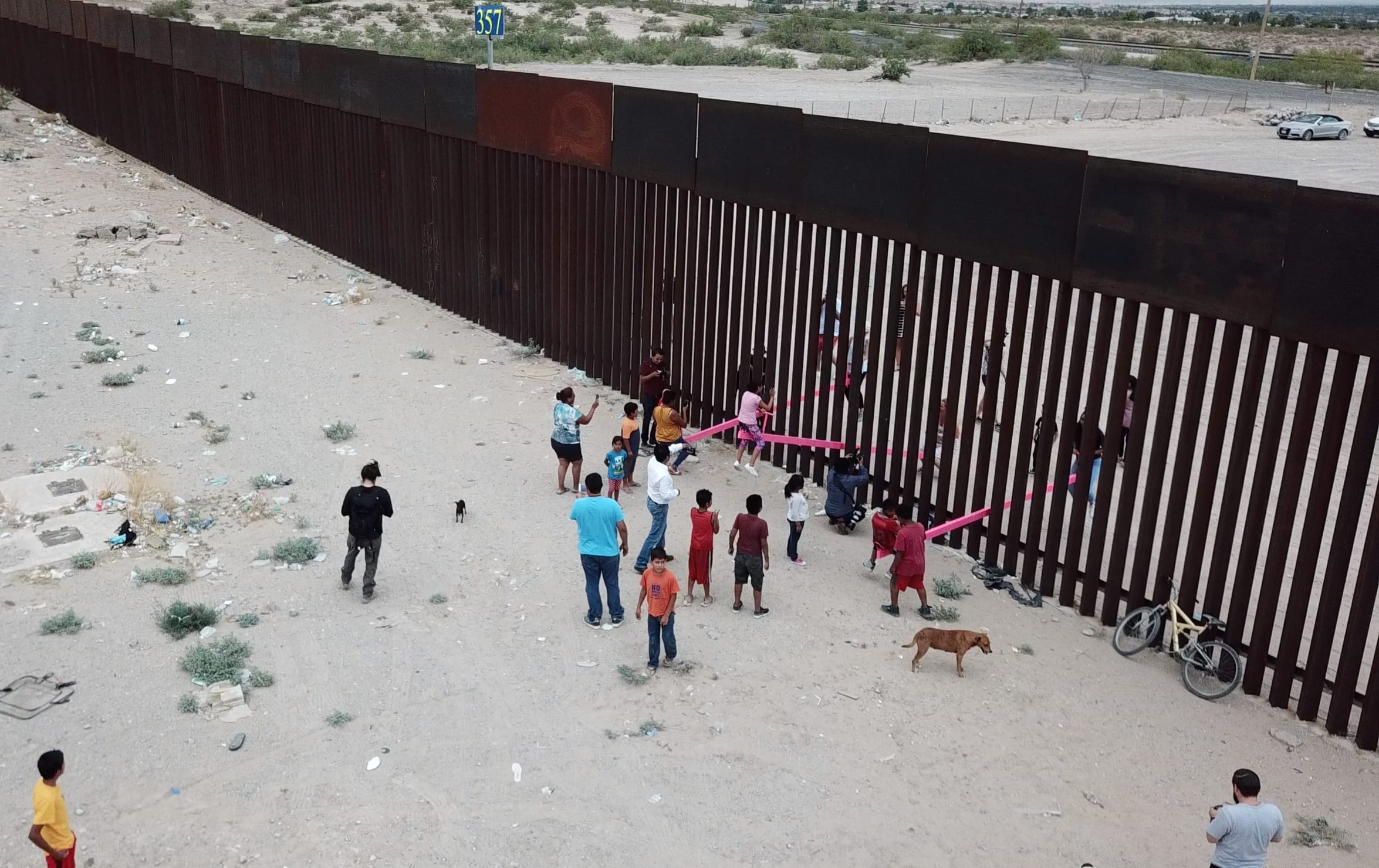 Teeter totter seesaw on the US-Mexico border wall.