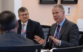 Paul Ash, Special Representative on Cyber and Digital for the Department of Prime Minister and Cabinet speaks to the Governance and Administration Committee about progress on the Christchurch Call cyber crisis intervention project. Watching on is DPMC Chief Executive Tony Lynch.