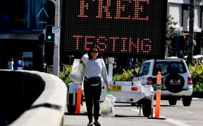 An electronic screen advertises free COVID-19 testing being offered at Bondi Beach in Sydney today.