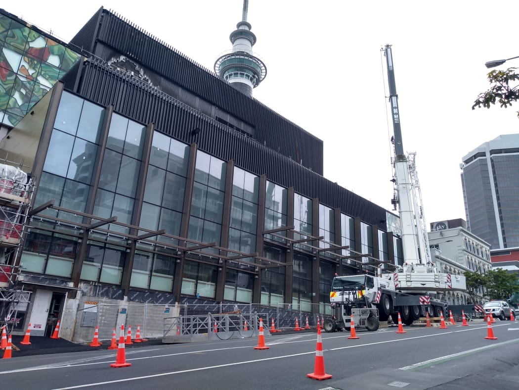 Cordons around SkyCity remain as firefighters continue to monitor and investigate the damaged roof area where the blaze erupted.