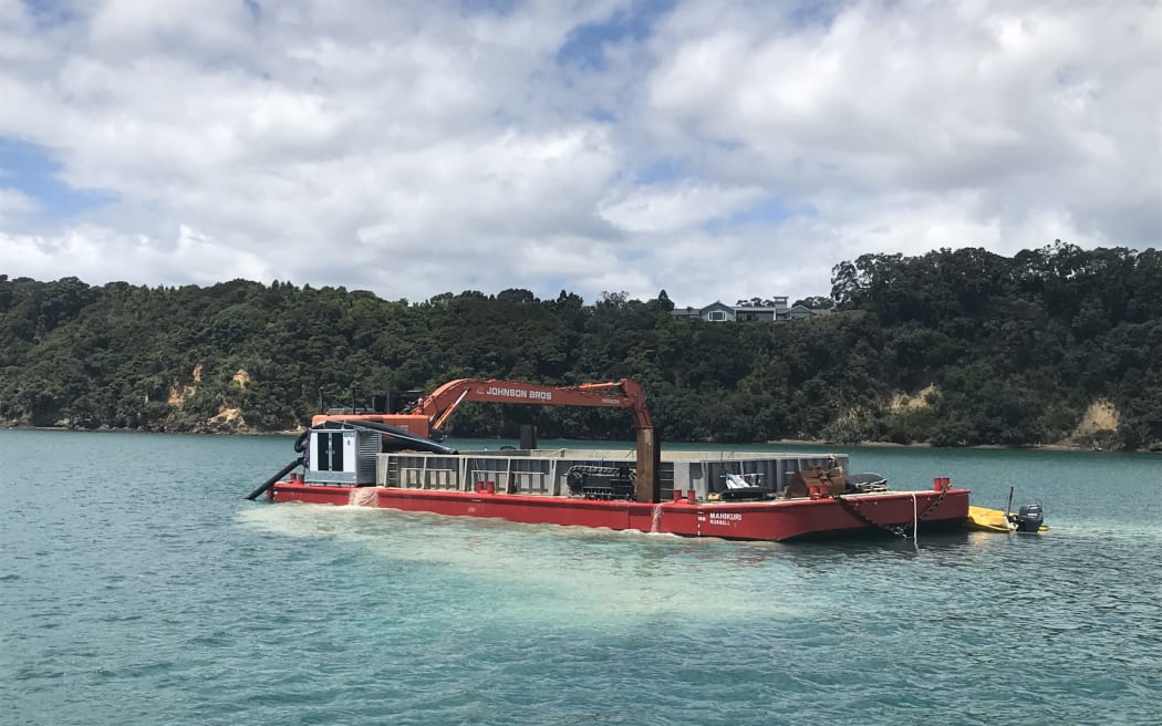 New Zealand's first mechanical caulerpa suction dredge in action in Omākiwi in the Bay of Islands.