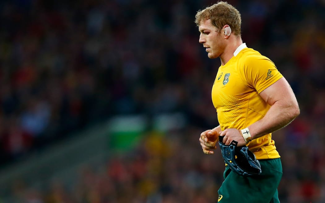 David Pocock leaves the field during Australia's RWC win over Wales.