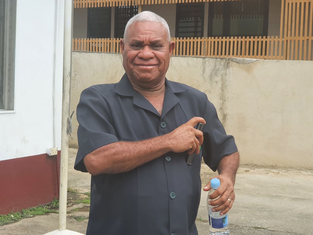 Vanuatu PM, Bob Loughman, outside the courthouse